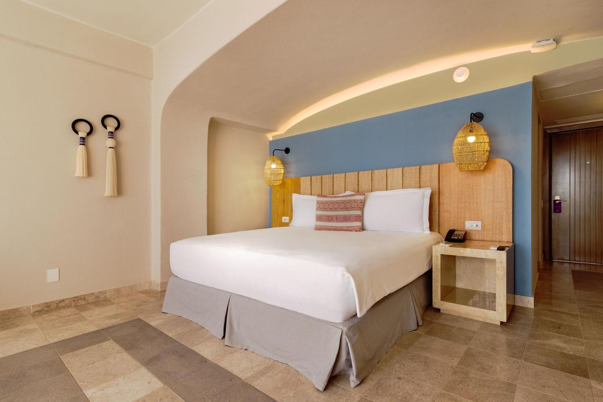 Hotel Camino Real Acapulco Diamante Esterno foto A bedroom at the Iberostar Grand Hotel at Playa Paraíso, Tenerife